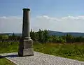 View of Klínovec from Fichtelberg (meridian a 1864 fixed point from at the front)