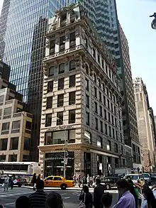 View of the Knox Building from 40th Street, with the glass HSBC Tower behind it