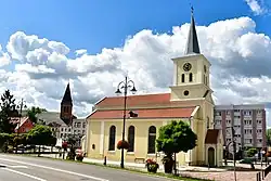 Center of Sztum with the Church of Our Lady Help of Christians in the foreground and Church of Saint Anne in the background