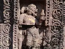 A sculpture on the temple wall