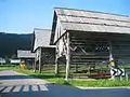 Roofed double hayracks