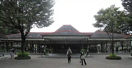 Front of palace, with two trees