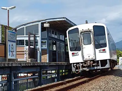 A picture of the mascot can be seen under the station name board.