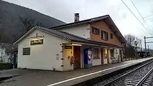 Two-story building with gabled roof