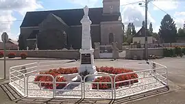 The war memorial and church in Labergement-lès-Auxonne