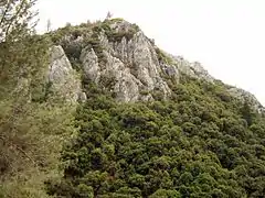 The mountain visible as you walk down to the visitor center from the cave exit.