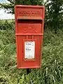 A British Lamp Box post box of the circa-1954 pattern in Eaves, Lancashire.