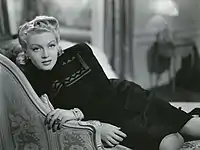 Woman lounging on a couch