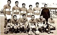 Eleven Lebanese football players posing for a photo prior to a football match