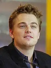 A photograph of Leonardo DiCaprio attending a press conference for The Beach.