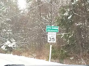 Welcome sign for Little Harbor on County Road B