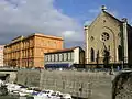 The church and the Fosso Reale, the latter also in need of restoration