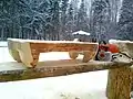 Bedside table made from a log cut in half