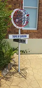 Monument marking Tropic of Capricorn near Civic Centre,  Longreach, at mid-day of Summer solstice 2019. The monument is few arc seconds South of Tropic of Capricorn(notice shadow directly below the sign)