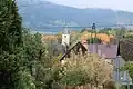 Autumn in Lubiechowa with a tower of a gothic church of Saint Peter and Paul