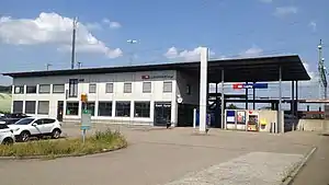 Two-story building with flat roof