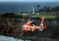 USCG MH-65 flies by