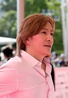 A 2014 photograph of Tetsuya Komuro