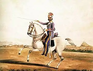 Indian cavalry trooper armed with a sabre and two pistols