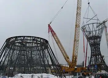 Raising of the top using a crane