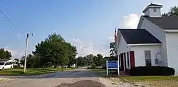 Looking up Main Street in Saltillo, Indiana.  Saltillo Christian Church is visible in the foreground.