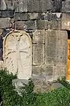 Large khachkar to the left of the main entry to the church.