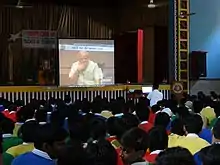 Students from Gaya watching the Prime Minister's address to the nation in 2015