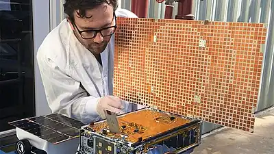 Marco Cubesat, showing the unfolded Reflectarray antenna