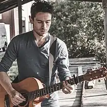 Mark Wilkinson recording a music video in south Sydney, Australia, 2013.