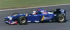 Martin Brundle Driving the JS41 in its non-tobacco livery at the 1995 British GP