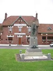 The town hall, school and monument to the dead of Martinpuich