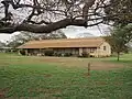 Older, plantation-style wooden school building