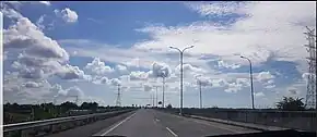 Melintas awan di jalan tol pp.jpg