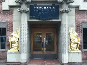 Merchants National Bank entrance with gold winged lions,  Grinnell, IA