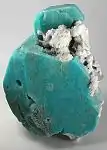 Large deep-turquoise amazonite crystal with attached stark-white microcline, from Konso, SNNPR, Ethiopia. Size: 16.4 cm × 11.9 cm × 8.0 cm (6.5 in × 4.7 in × 3.1 in).