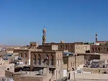 Old Midyat against a blue sky