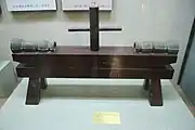 Replica of Ming dynasty cannons mounted on the opposite direction of a wooden frame, 1372.