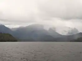 Mist falls into Kumealon Inlet, British Columbia, Canada