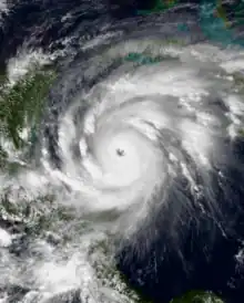 Satellite image of Hurricane Mitch over the Western Caribbean Sea with a large and well defined eye