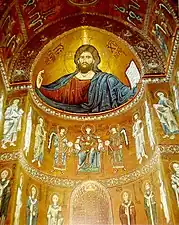 Interior of a Byzantine church, the Cathedral of Monreale in Sicily, with a mosaic portrait of Christ dressed in red (12th century)