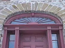 The inn once welcomed travelers under this transom, or fanlight.