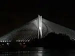 The Rędziński Bridge illuminated at night