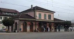 Two-story building with hip roof