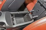 USB port, 3.5mm auxiliary jack, and SD card slot inside Mustang's center console storage