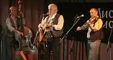 Photo of  Mucky Duck Bush Band at CD/Book Launch, Fairbrdge Festival, April 26, 2014. L-R: John Perry, Don Blue, erik Kowarski