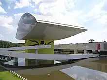 Lateral view of the Oscar Niemeyer Museum showing the lenticular eye tower.