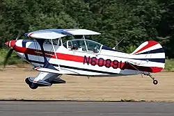 An airplane landing at Zwartberg Airfield.