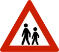 ChildrenWarns that children often traverse or walk on the roads due to a nearby school, child-care center, playground or similar.