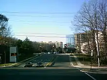 Big street with cars waiting at intersection