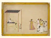 Raja Balwant Singh watches performers